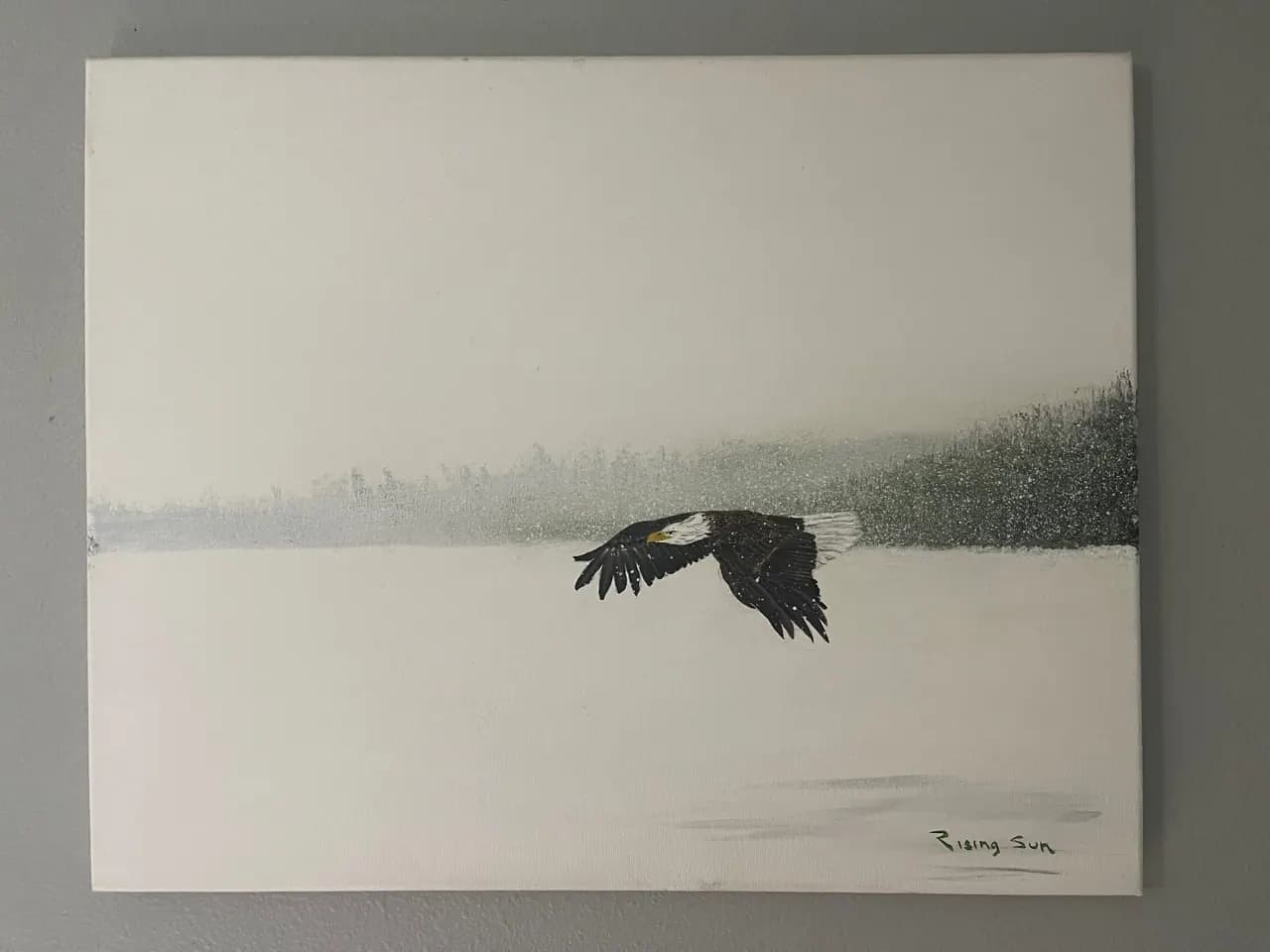 Eagle Over Winter Water, artwork by Clarence Rising Sun